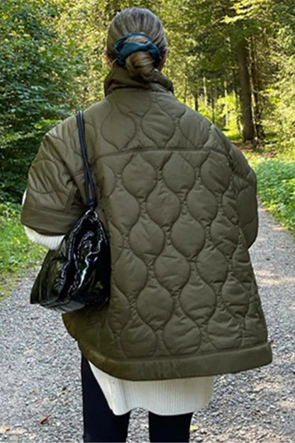 Manteau court matelassé à col montant